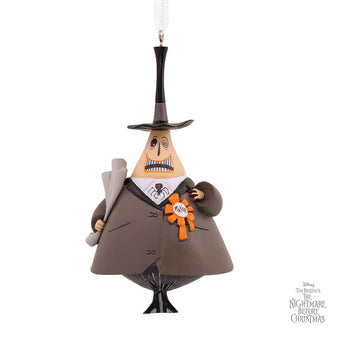 A Hallmark Disney Tim Burton's The Nightmare Before Christmas Mayor Christmas Ornament, featuring a resin depiction of the Mayor of Halloween Town wearing a suit with a spider bow tie and a 'mayor' ribbon, holding a cane, with a hanger attachment at the top.